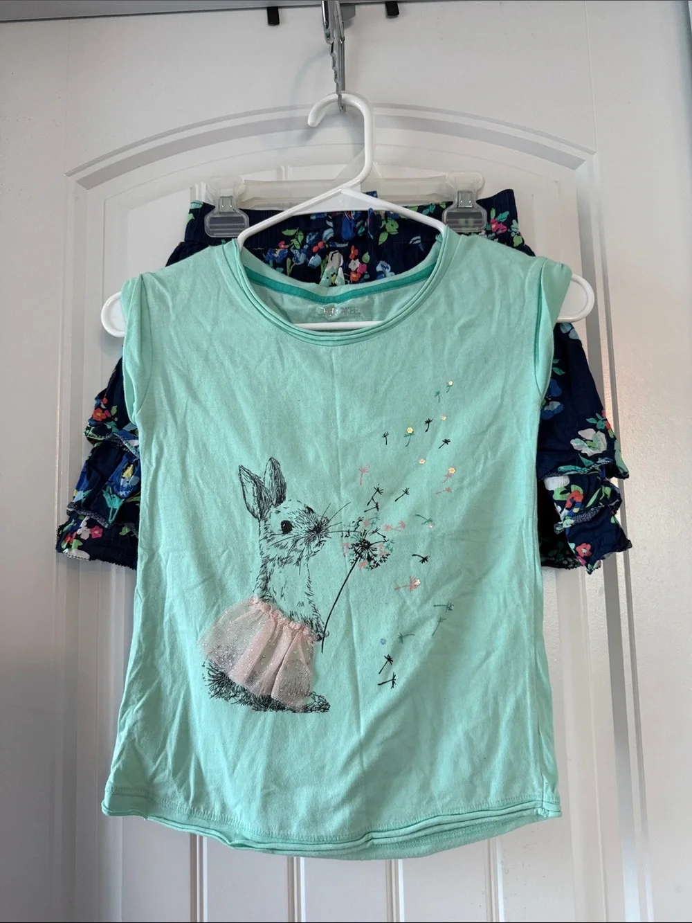 Gently worn Cherokee Mint Bunny Graphic Tee with Navy Floral Skirt Set
